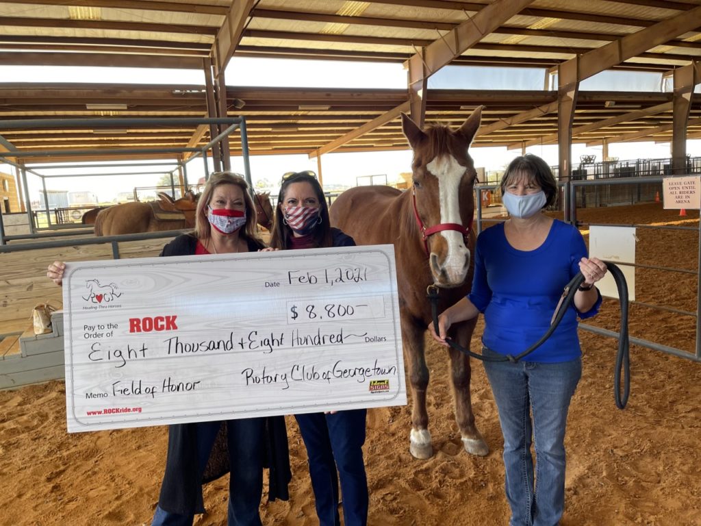 Rotary Club of Georgetown check presentation at ROCK