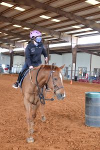 Sydney and Oakey going around a barrel