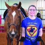 Sydney Middleton and Oakey, a brownish red horse